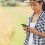 farmer-rice-field-with-smartphone_1150-6049