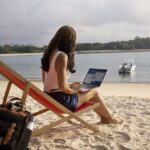 full-shot-woman-working-laptop